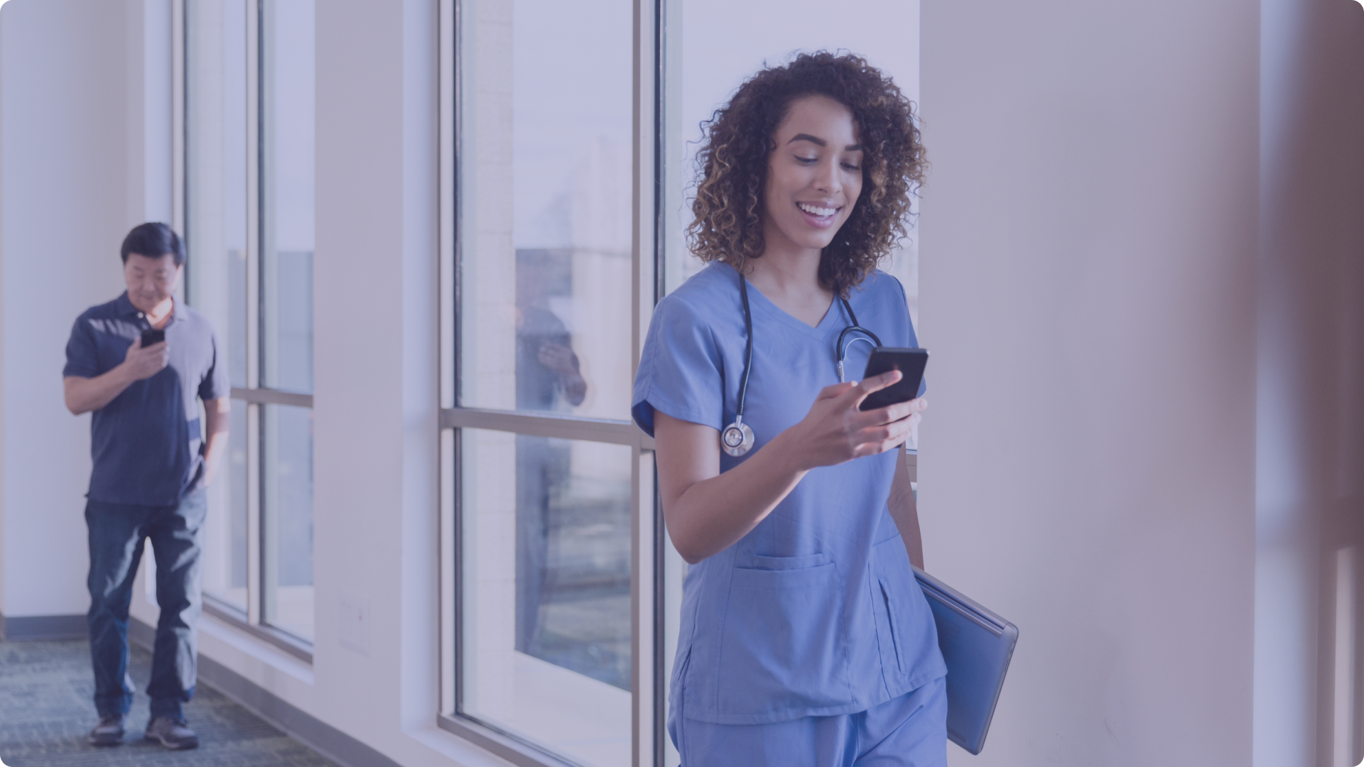 Image of health care worker using BookJane to pick up shifts on their J360 workforce mobile app
