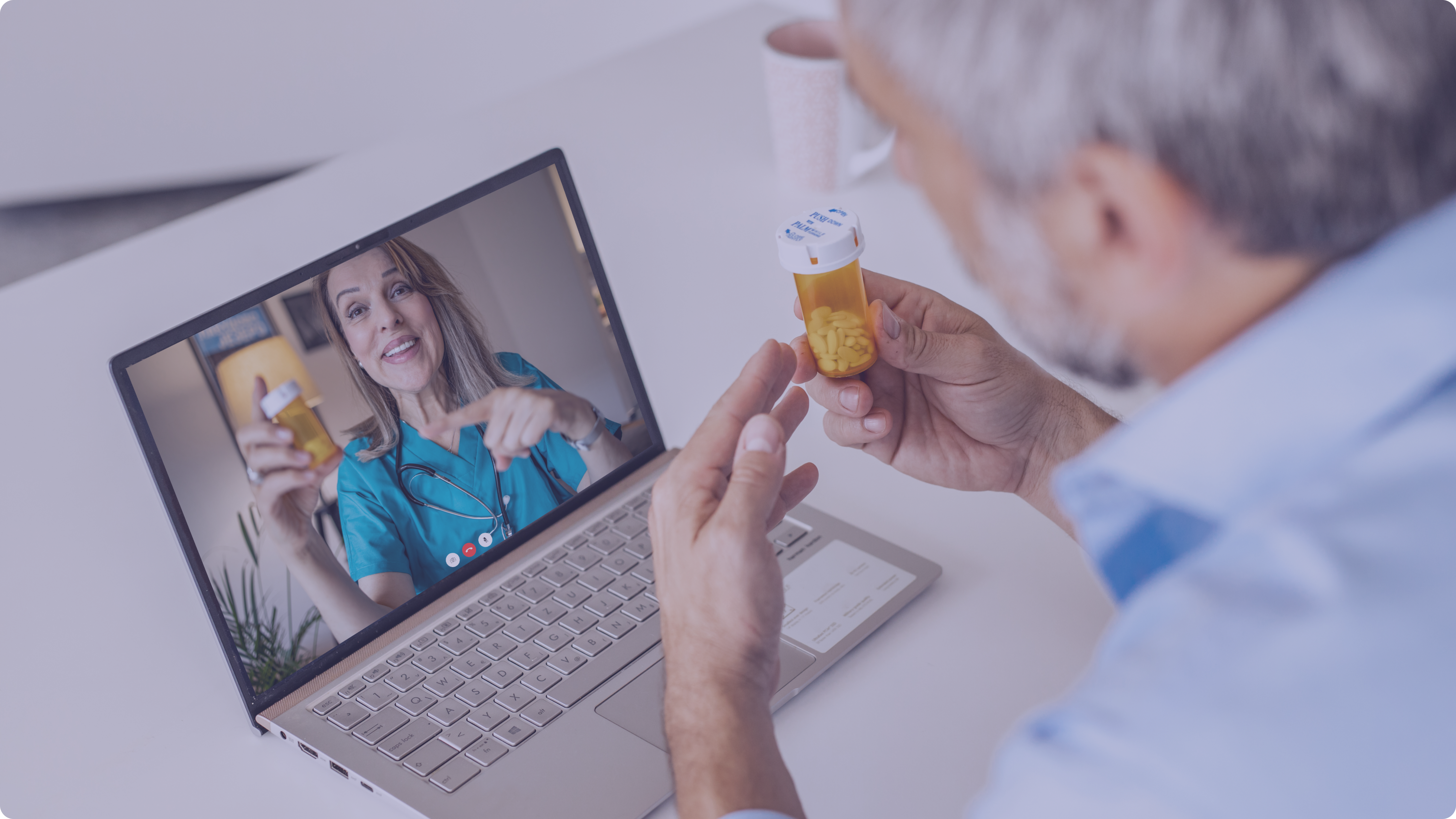 Image of senior care using telehealth app with a computer